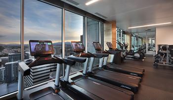 Fitness center with treadmills and panoramic windows